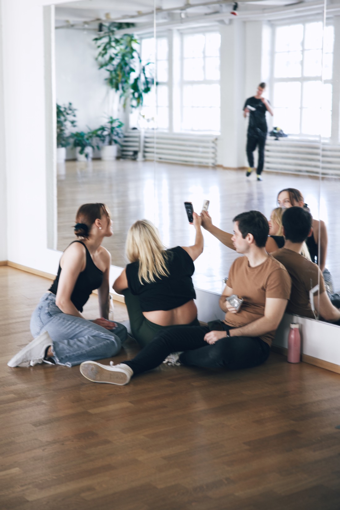 Dancers taking a break in the studio