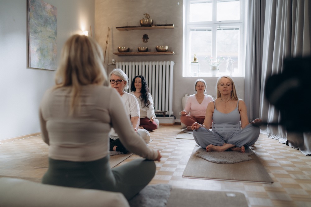 Group meditation in the studio