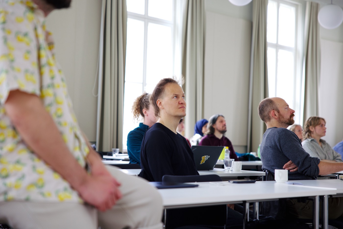 Audience following a talk
