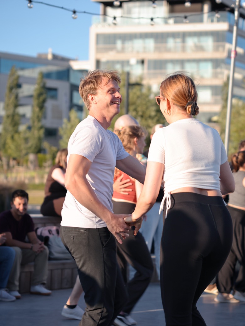 Partners mid-turn on the terrace floor