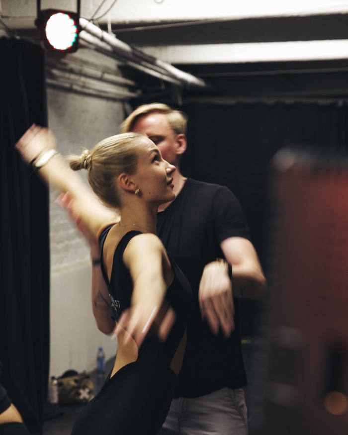 Dancers in motion backstage