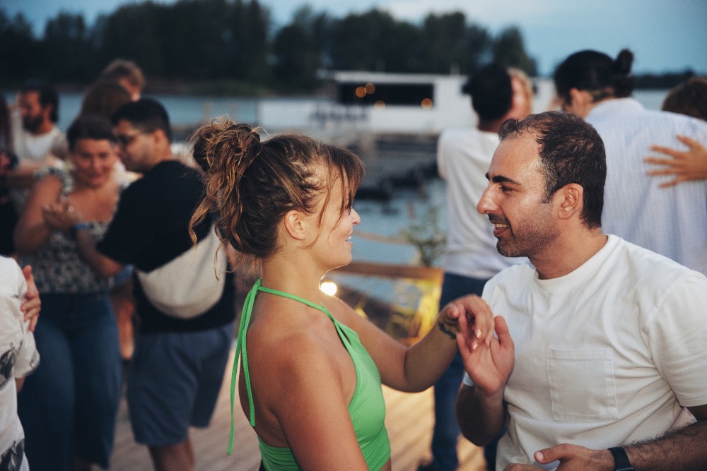 Dancers laughing on the deck