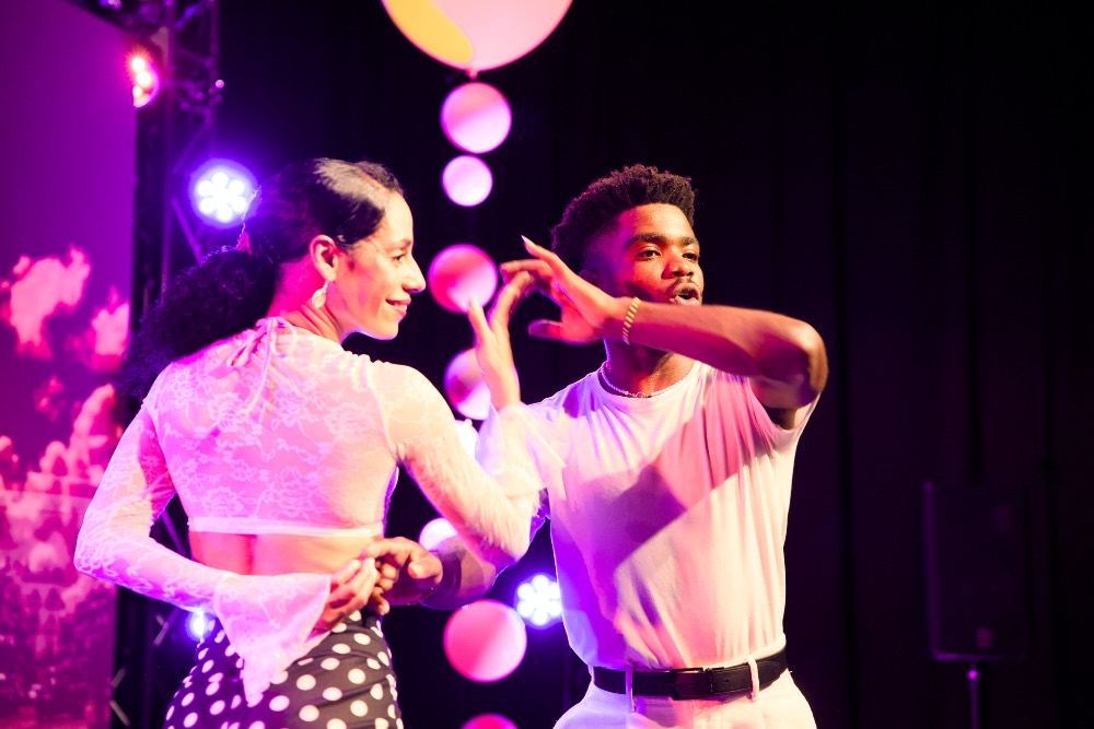 Dance partners performing on stage